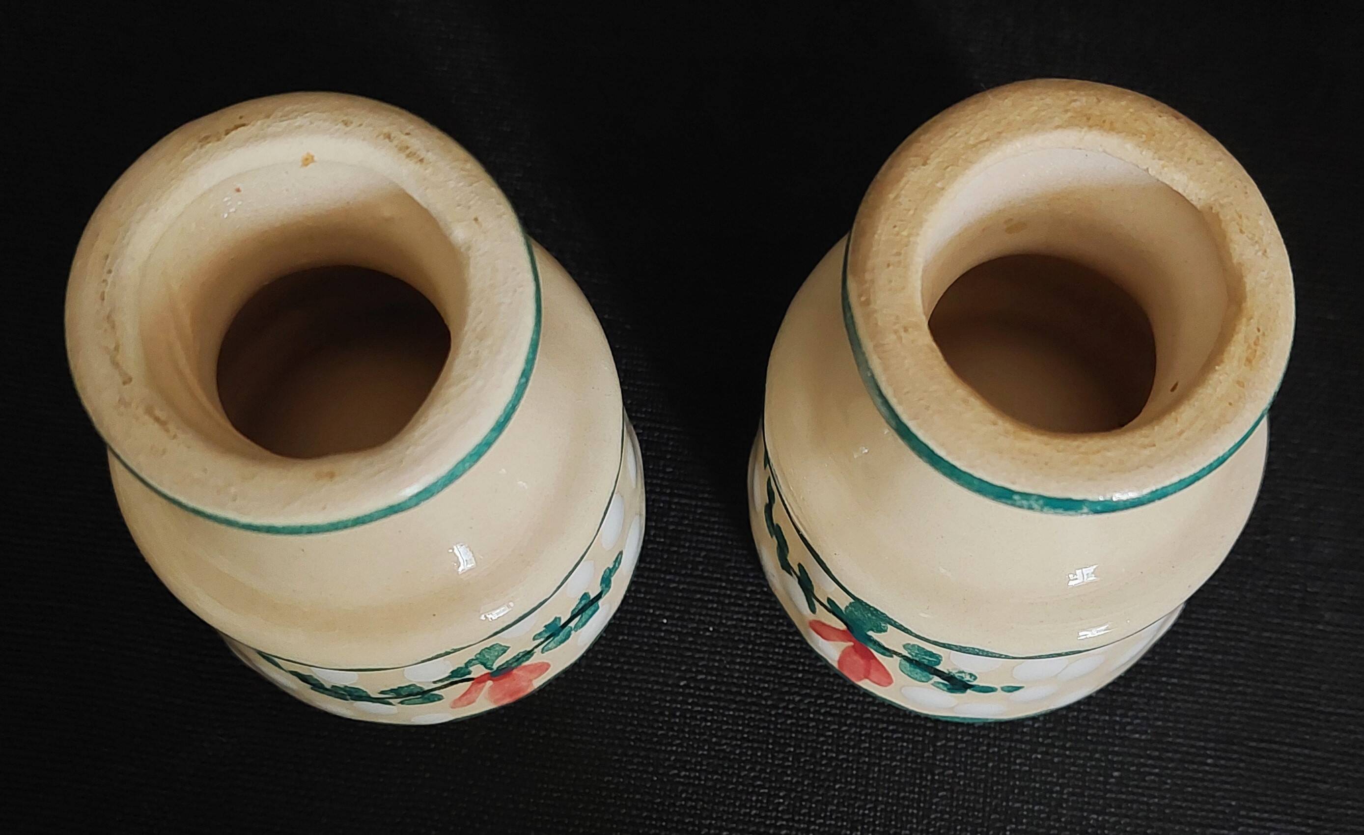 Pair of vintage earthenware egg cups with hand-painted decoration