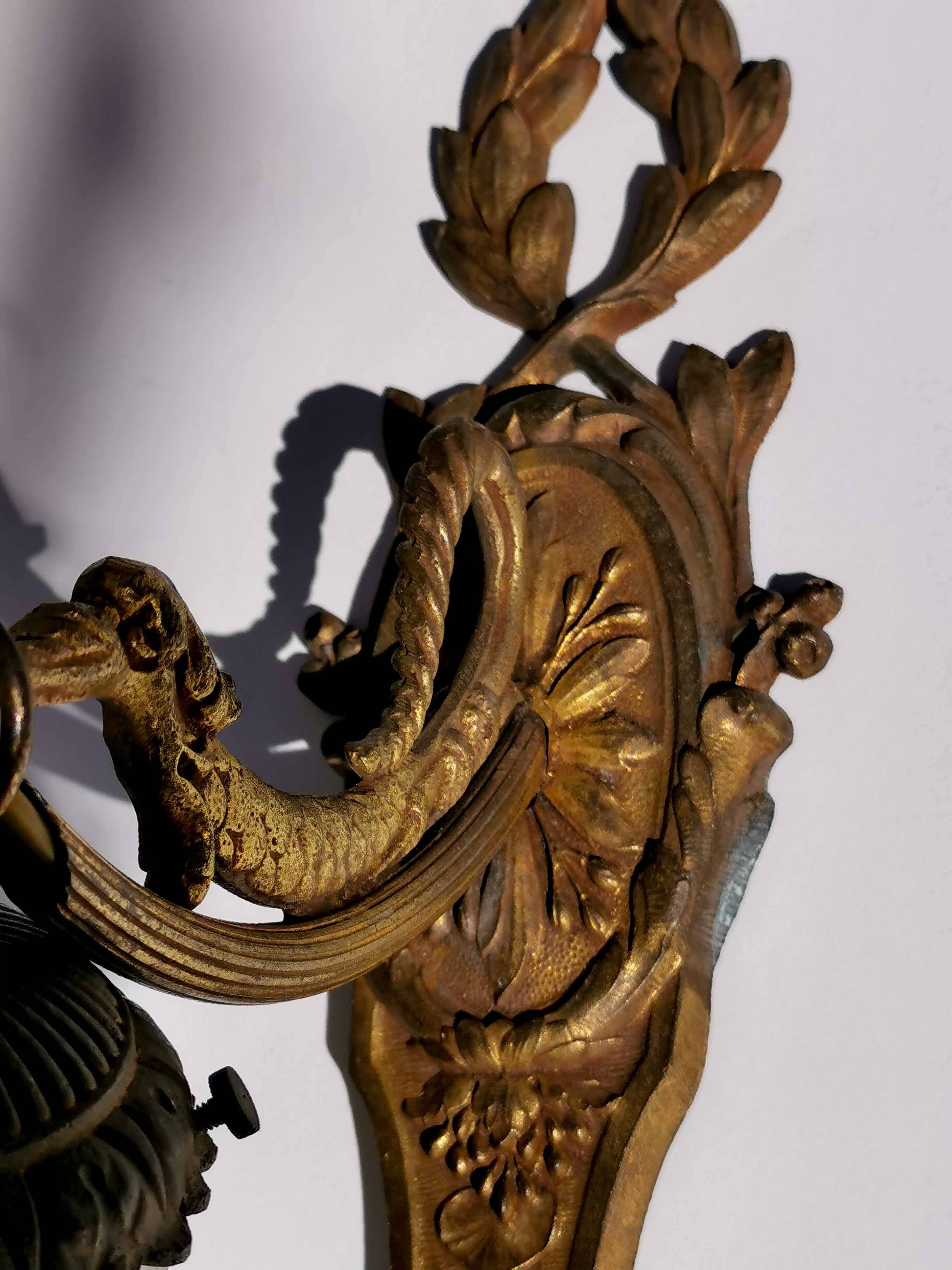 Antique bronze wall light