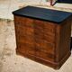 Small Louis-Philippe chest of drawers with four drawers, black top.