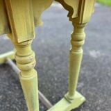 Old table with patinated green legs