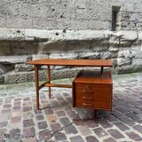 Mahogany desk with drawers by Jacques Hauville published by Bema.
