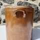 Trio of stoneware pots with lids