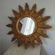 Miroir soleil bois sculpté doré