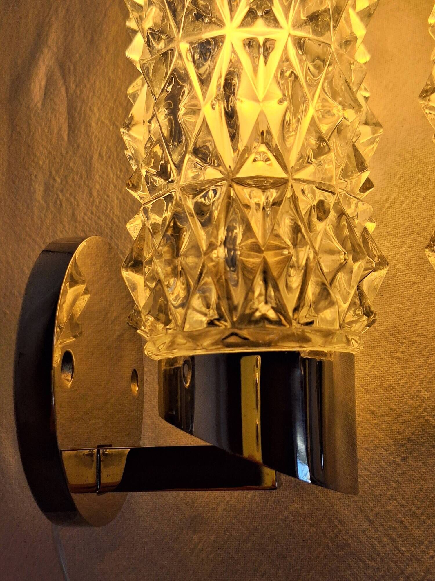 Pair of vintage Art Deco space age chrome and molded glass wall sconces