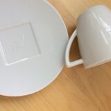 2 coffee cups and saucers