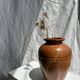 Large brown artisanal ceramic vase