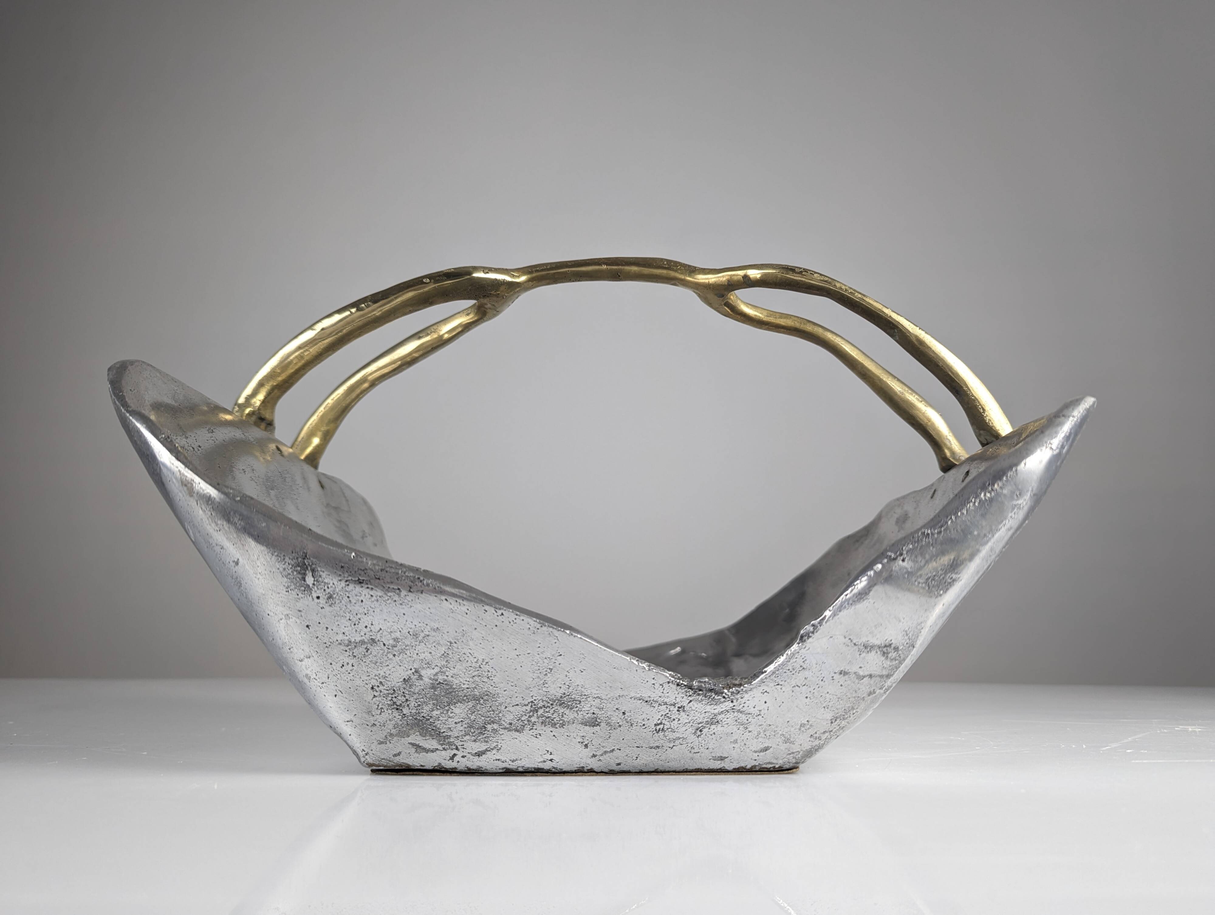 Firewood holder by David Marshall, 1980s