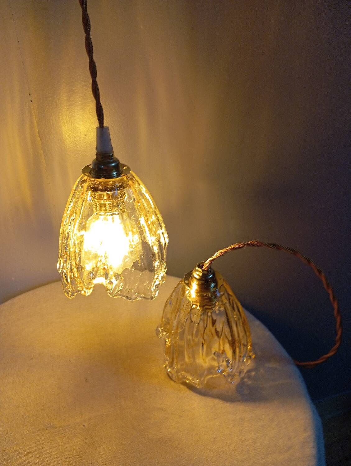Pair of draped blown glass hanging lamps, ocher twisted wire