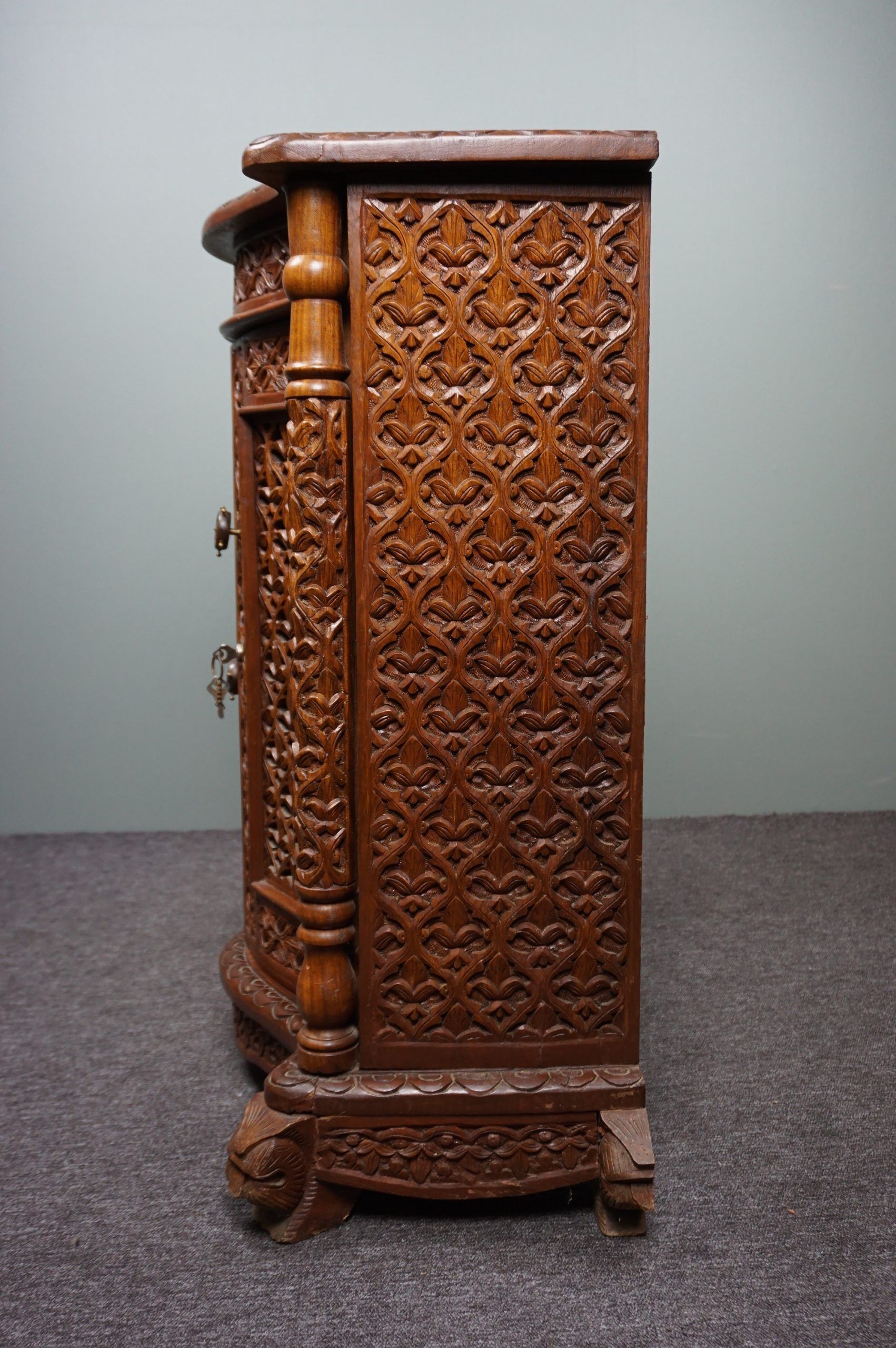 Carved wooden cabinet from the mid-20th century