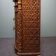 Carved wooden cabinet from the mid-20th century