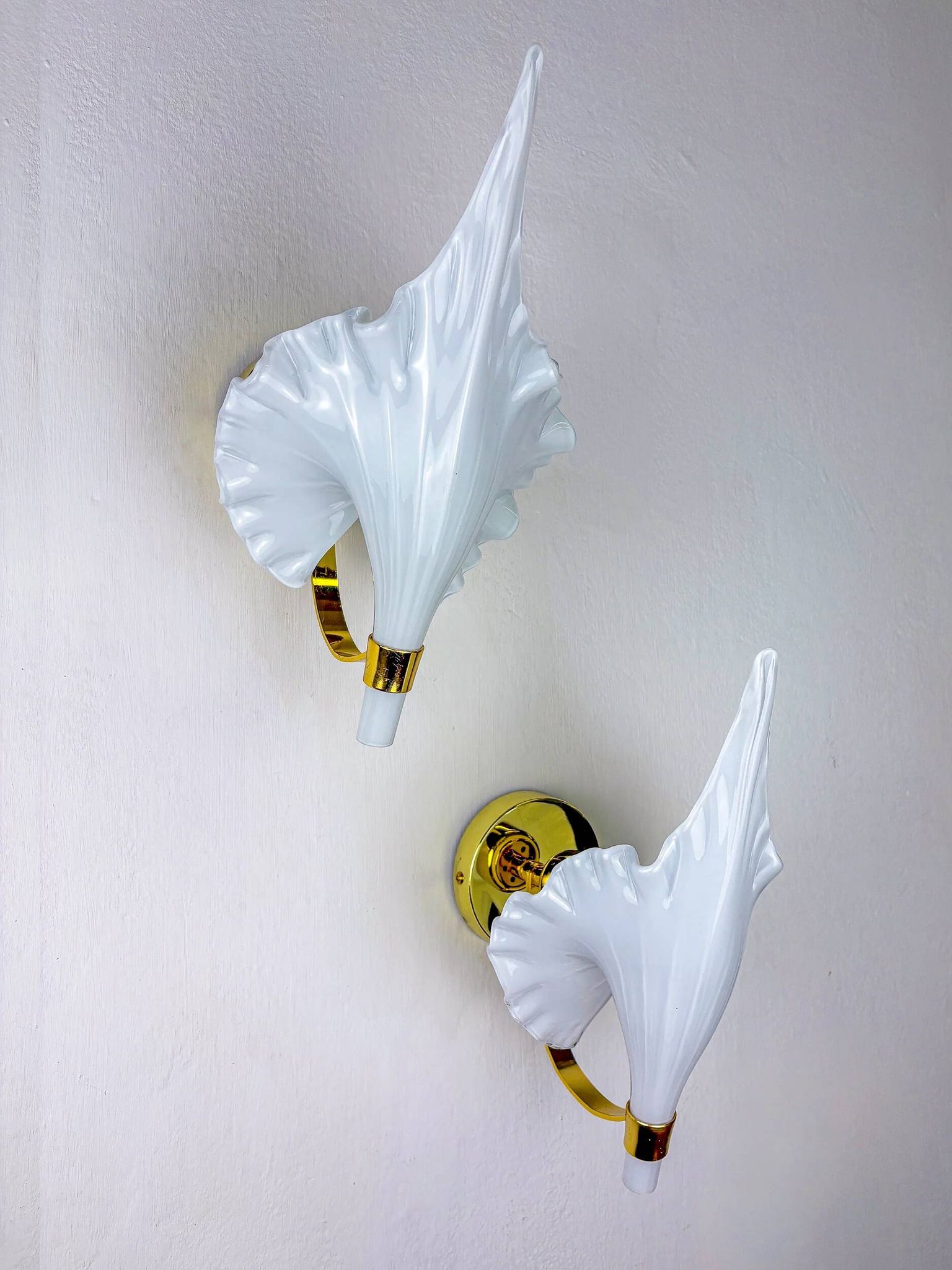 Pair of Italian "Calla Lily" leaf-shaped wall sconces, Murano glass & gilt brass, circa 1970s