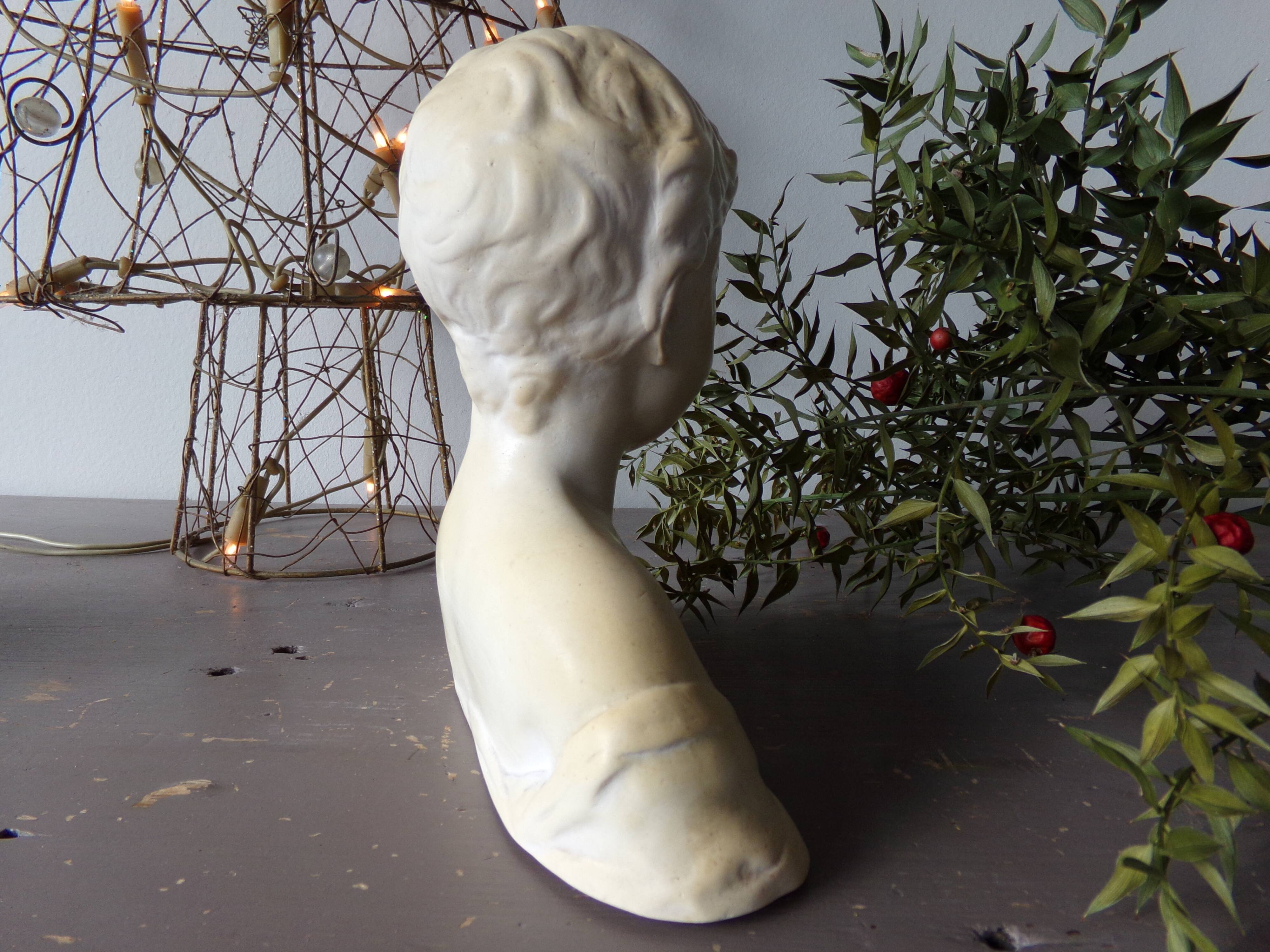 Bust of the laughing child