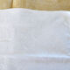 Set of 12 hand-embroidered cotton damask napkins