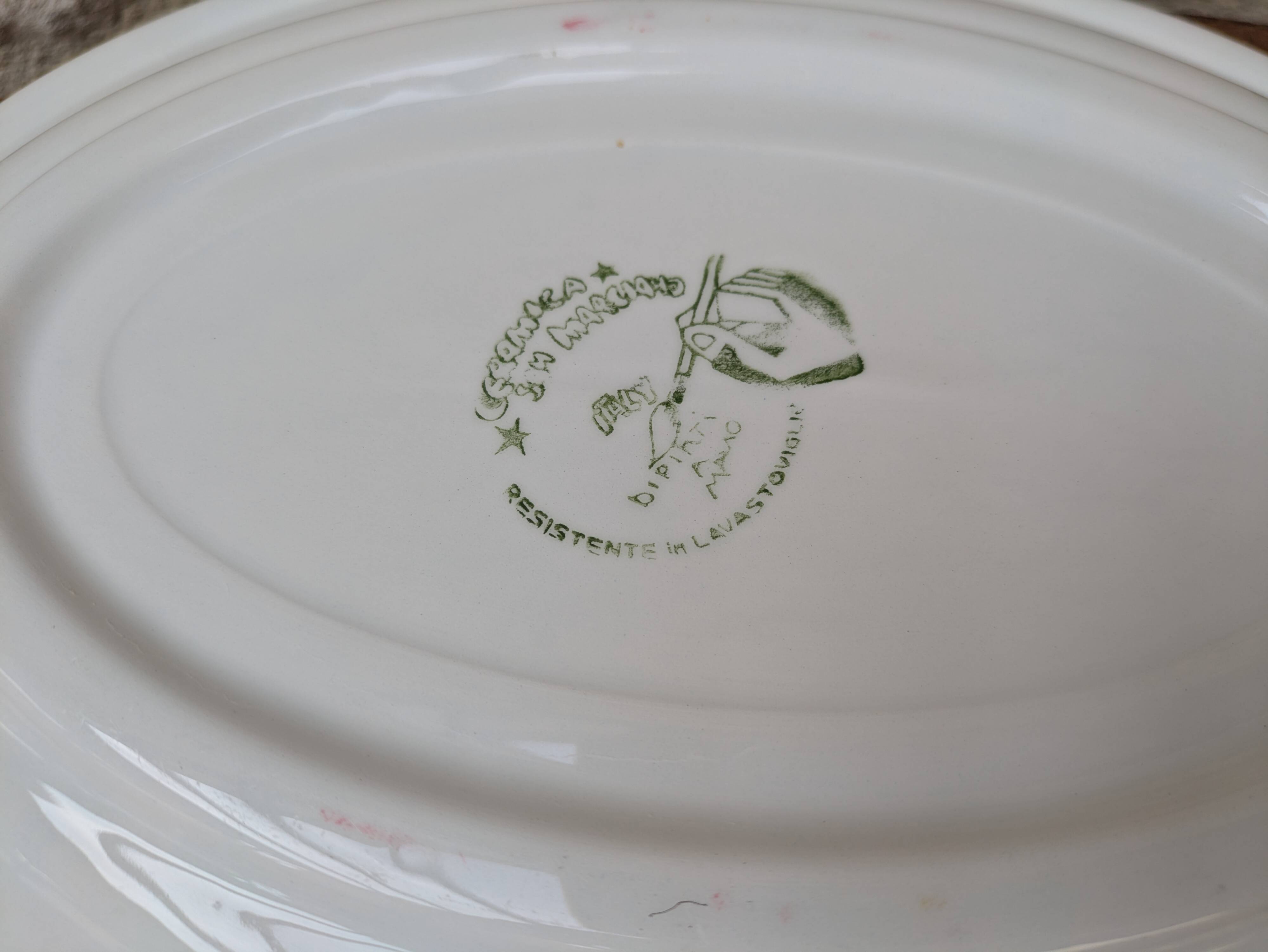 Oval serving dish with hand-painted pink flowers in San Marciano ceramic.