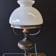 Very pretty lamp in tin with an opaline glass globe in very good condition.