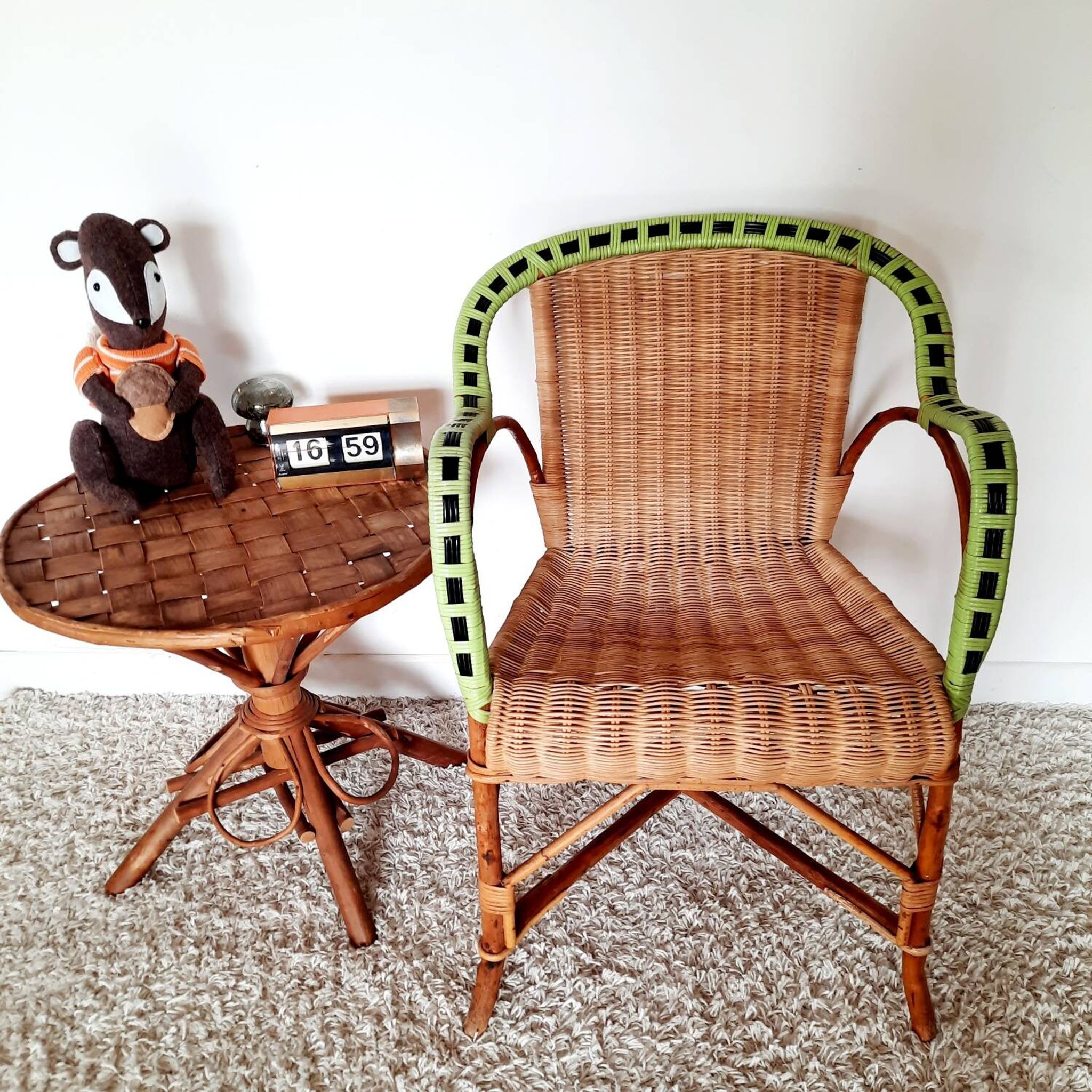 1950s 60s rattan armchair with green apple and black piping.