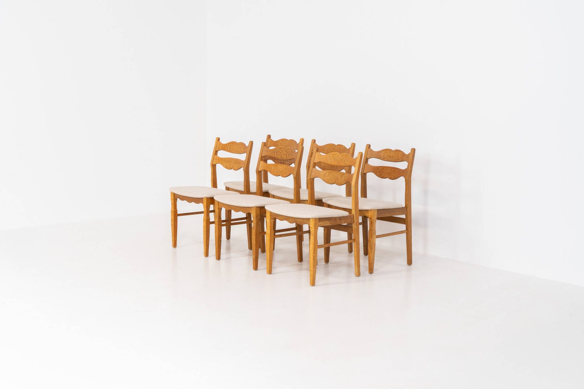 Set of 6 brutalist chairs in oak by Henning Kjaernulf