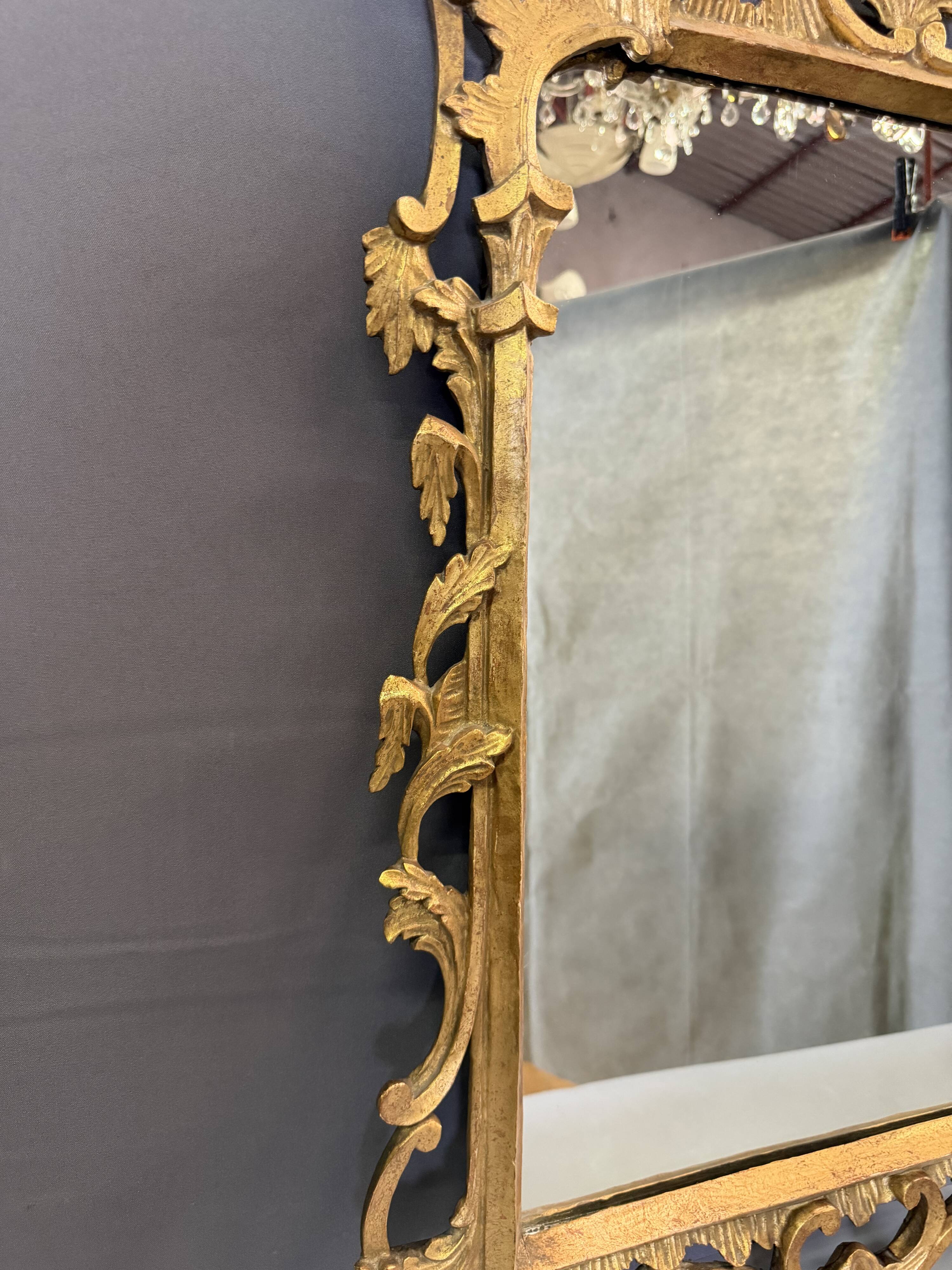 Italian mirror in gilded wood from the 19th century.