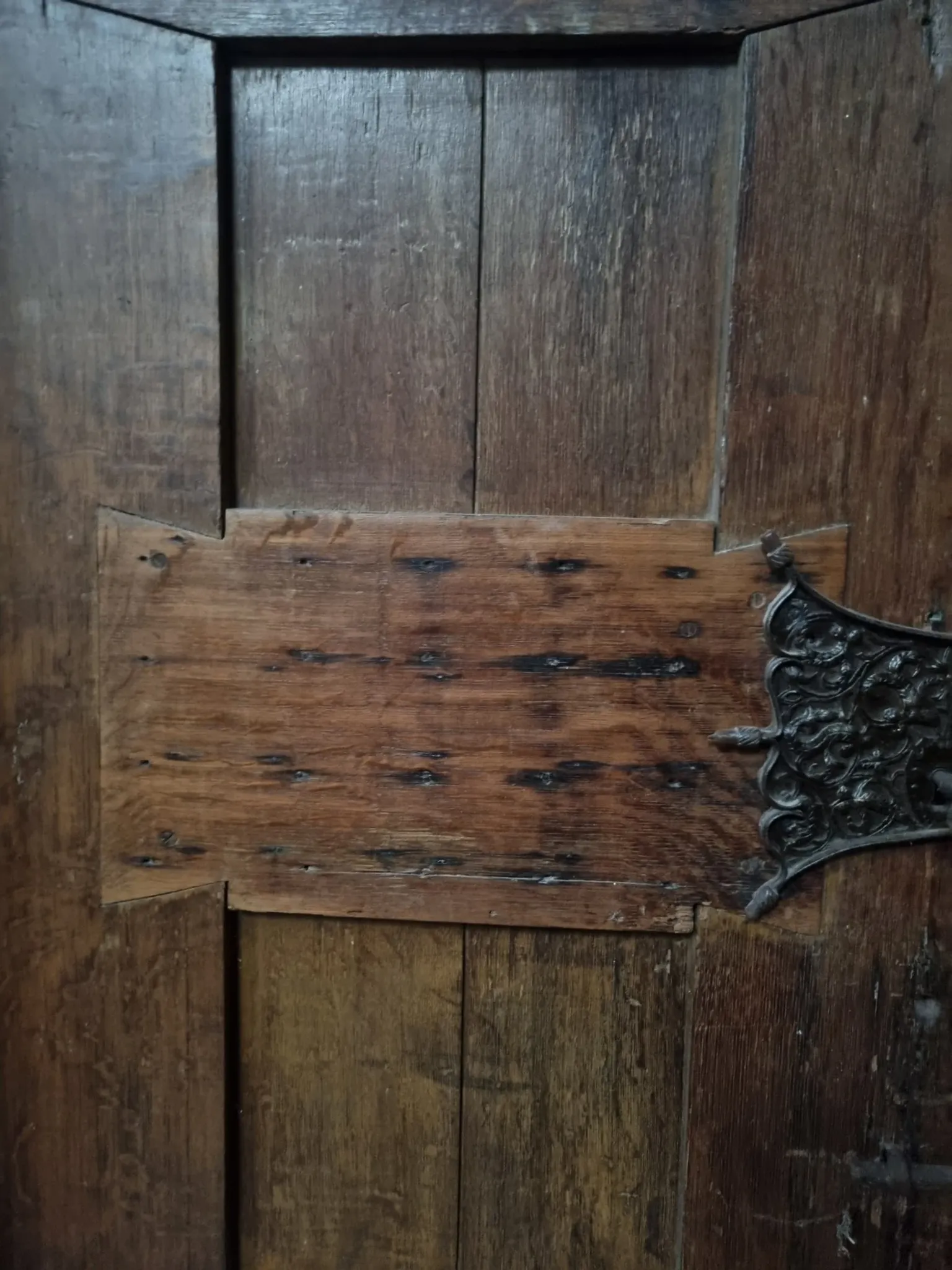 Antique oak door with frame and pierced wrought-iron lock – 16th–17th c.