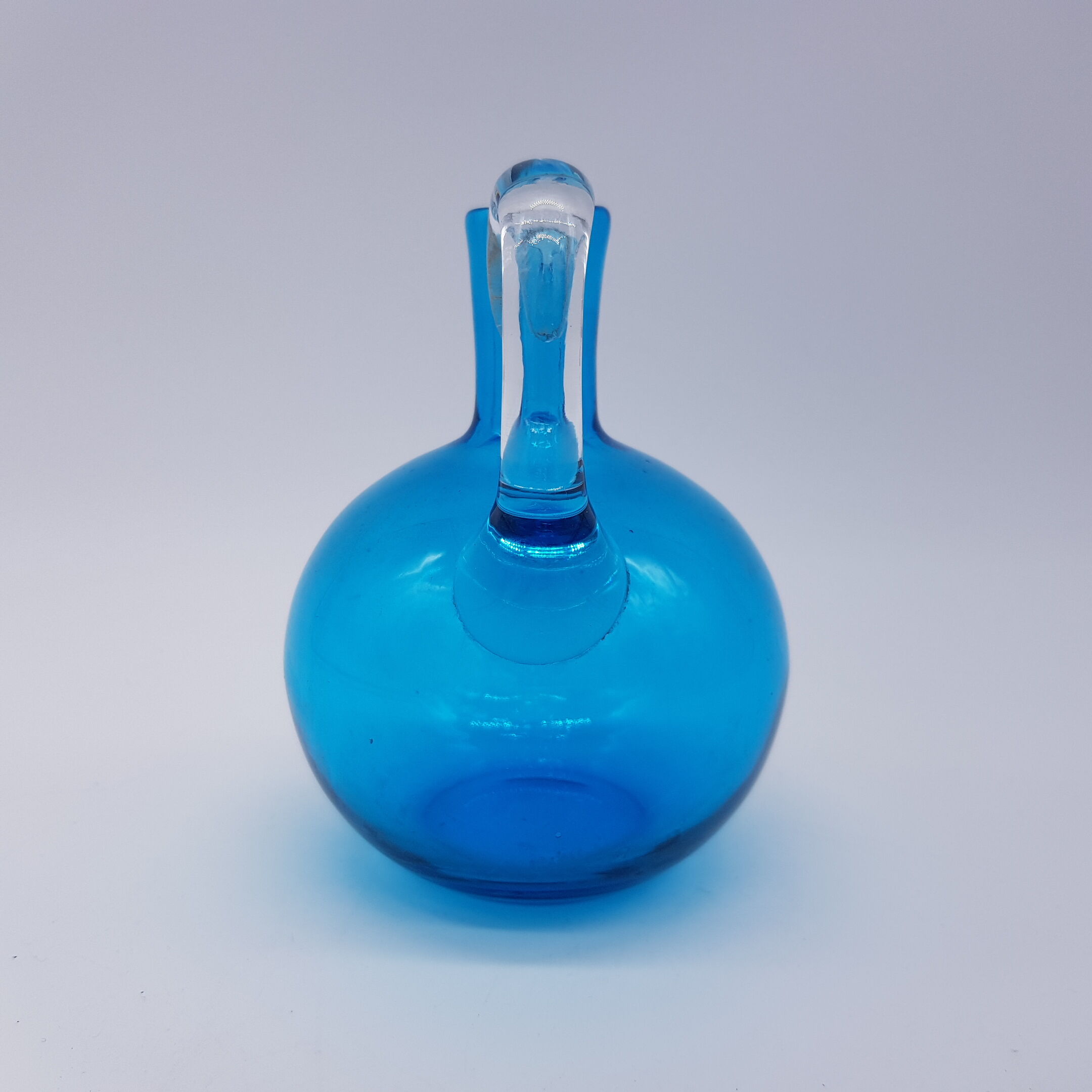Blue blown glass pitcher