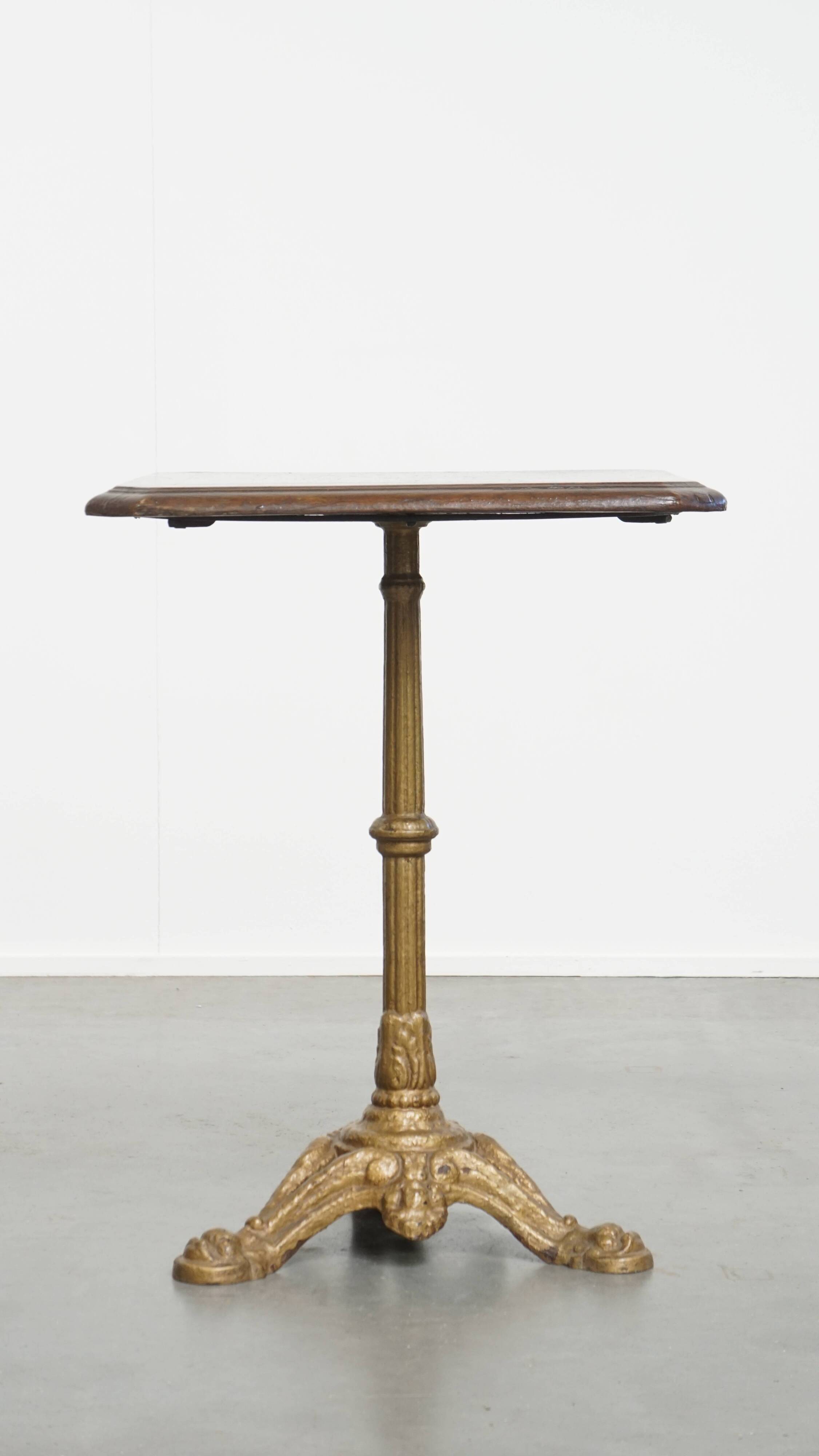 Antique Bistro Table with Gold-Colored Cast Iron Base and Dark Oak Top