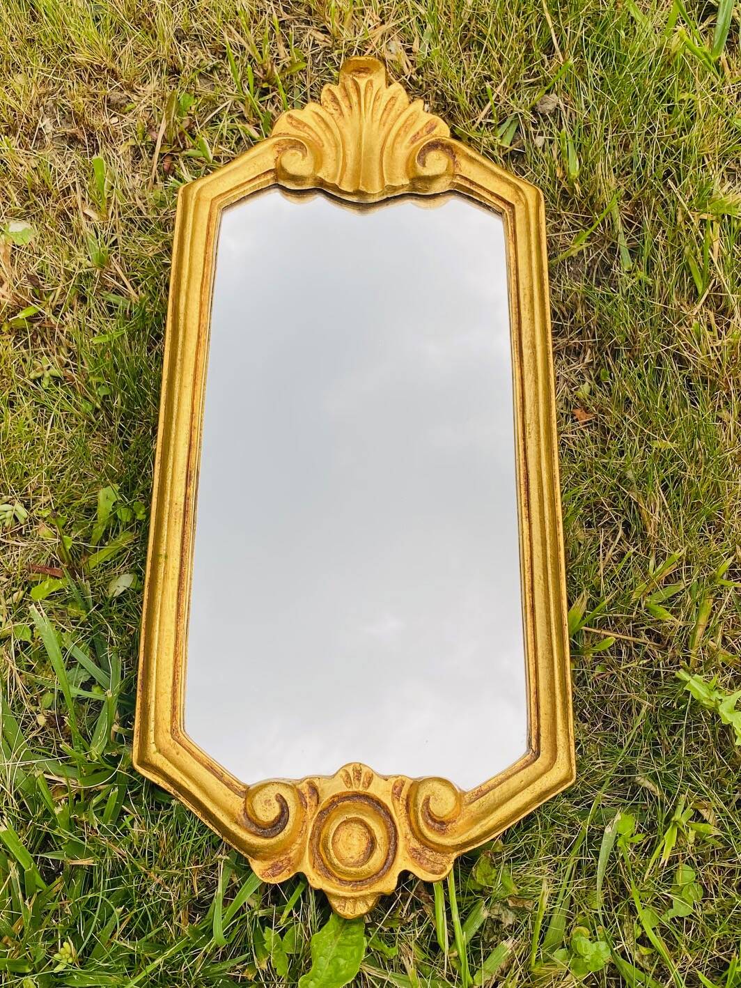 Antique gilded mirror.
