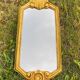 Antique gilded mirror.