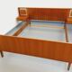 Vintage Scandinavian style double bed in teak from the 60s with integrated bedside lights