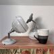 Pair of ceramic and glass wall sconces