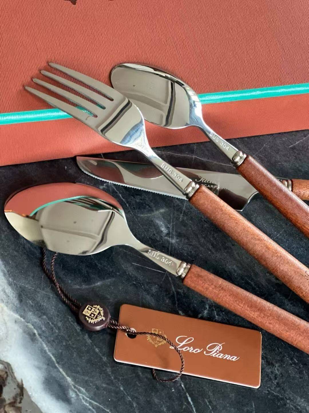 Loro Piana 4-piece mahogany knife and fork set