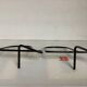 Pair of black metal bookends B