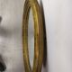 Golden oval mirror