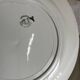 Set of 8 modernist flat plates in fine earthenware with pure gold trim, 1930.