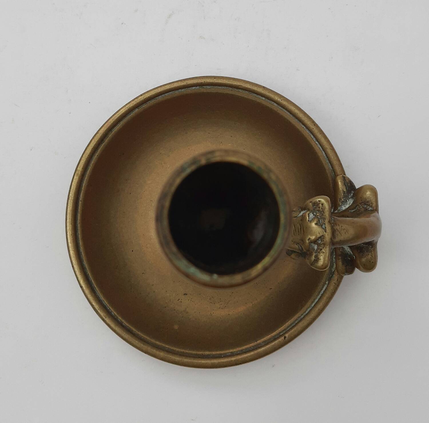 Antique bronze candlestick with dragon-shaped handle from the 17th century