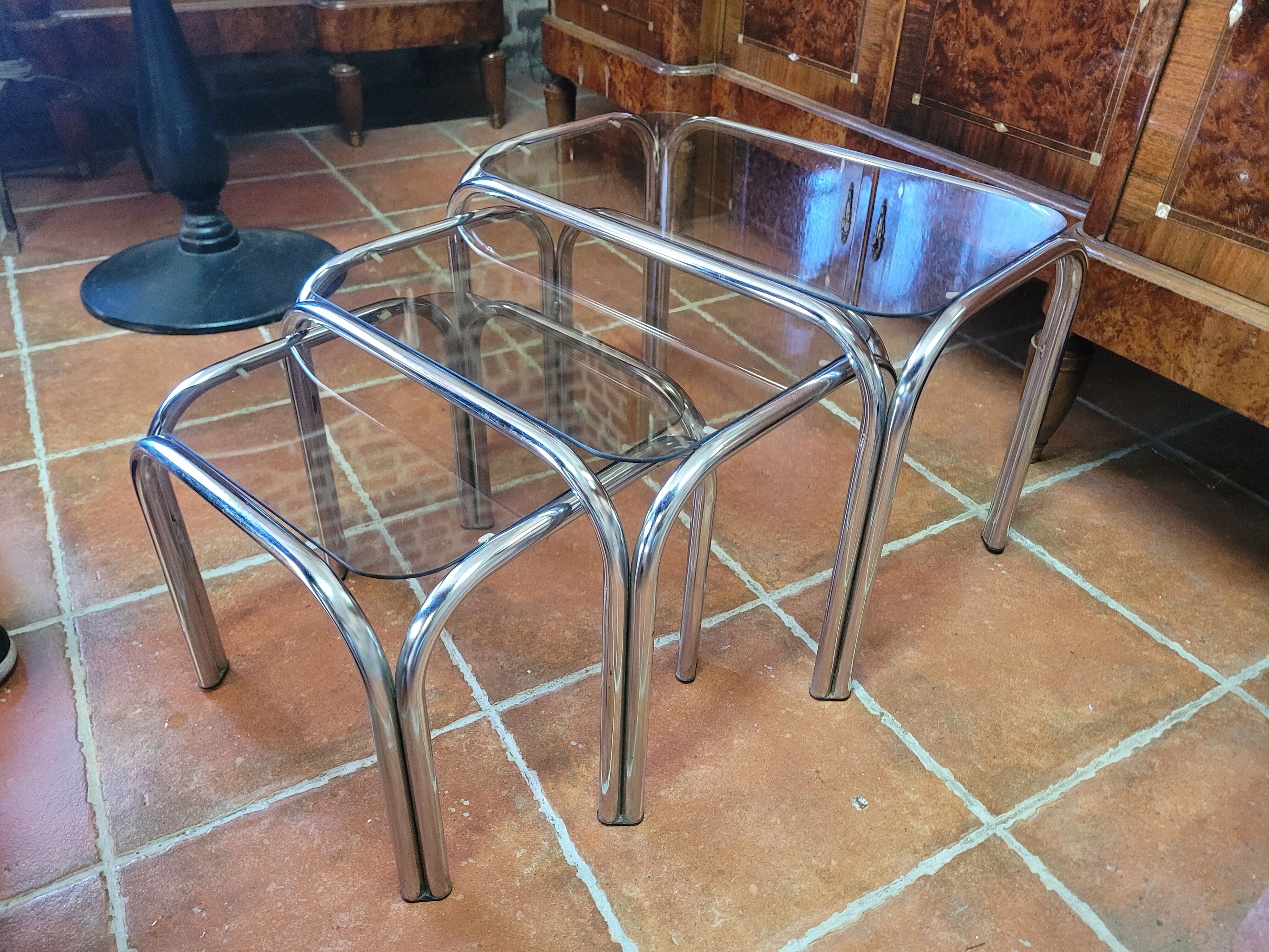 Chrome nesting table with smoked glass top from the 70s