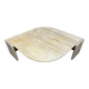 Table basse travertin forme œil par Roche Bobois