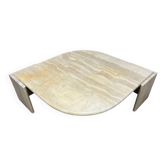 Table basse travertin forme œil par Roche Bobois