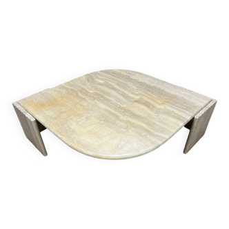 Table basse travertin forme œil par Roche Bobois