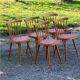 Set de 5 chaises vintage de bistrot en hêtre galette skaï rouge des années 50