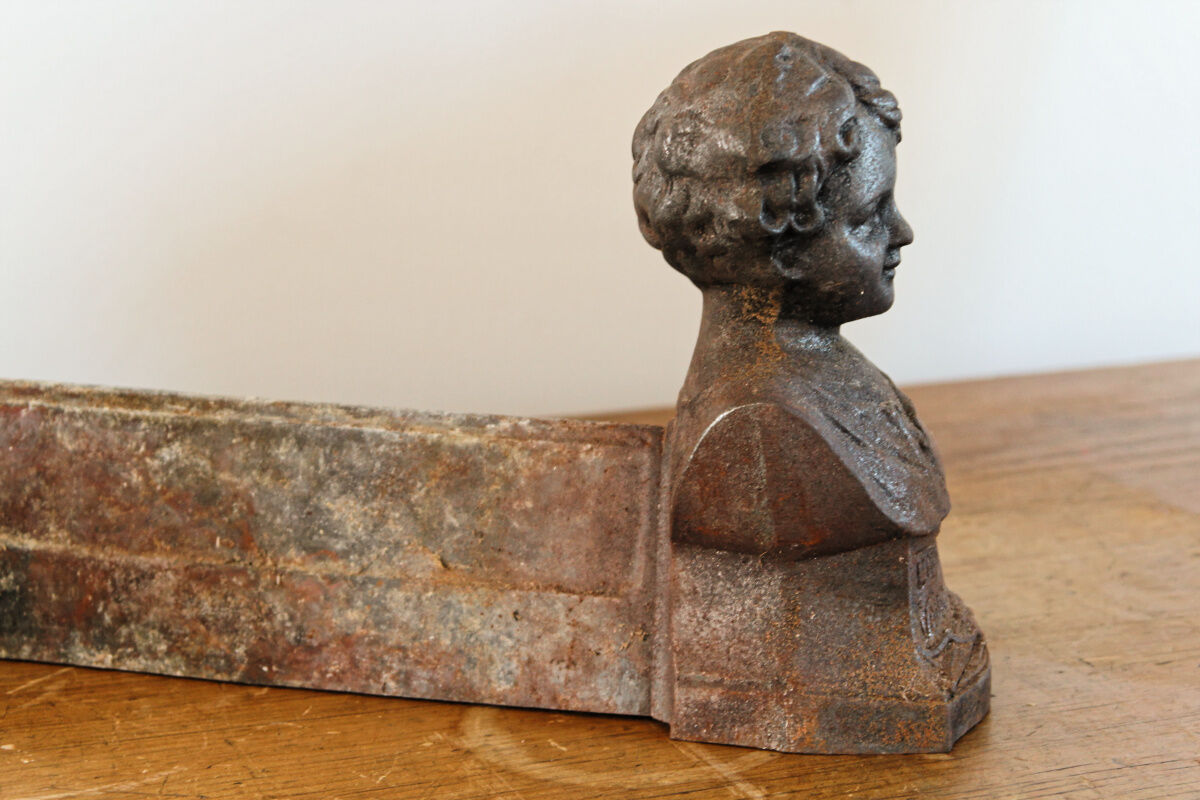 Pair of cast iron chenets, Love victorious