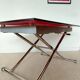 Table relevable vintage verre rouge et chrome-design 1970/1980