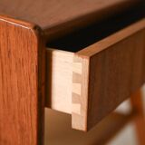 Bedside table with rattan magazine rack