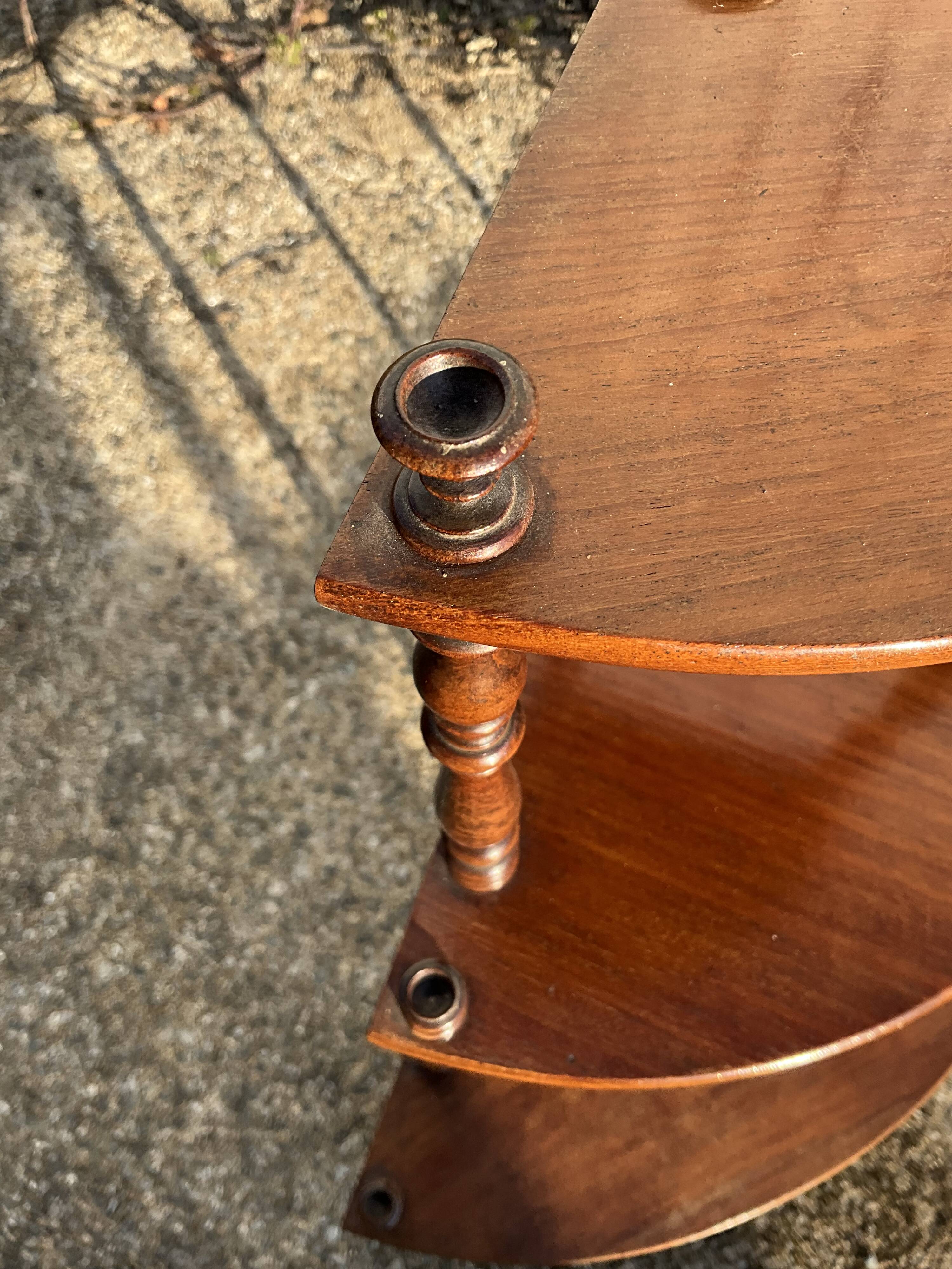 pair of corner wall brackets, Louis-Philippe style, in mahogany.