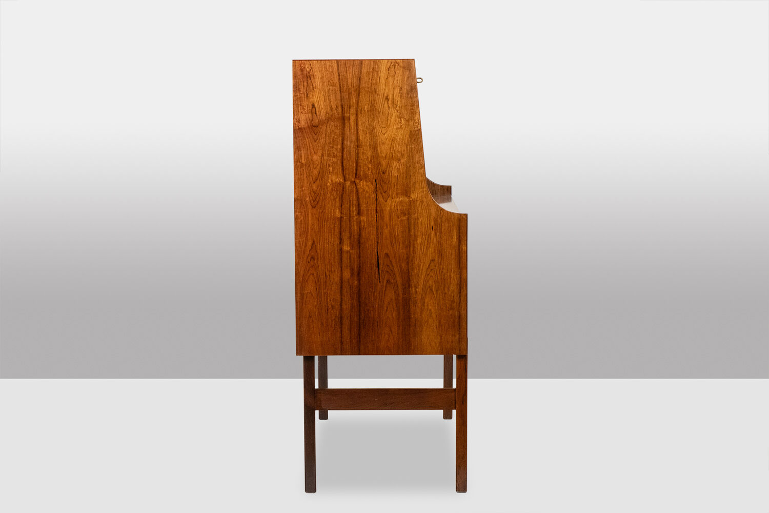 Rosewood chest of drawers with 2 drawers, forming a secretary. 1970s.