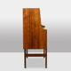Rosewood chest of drawers with 2 drawers, forming a secretary. 1970s.