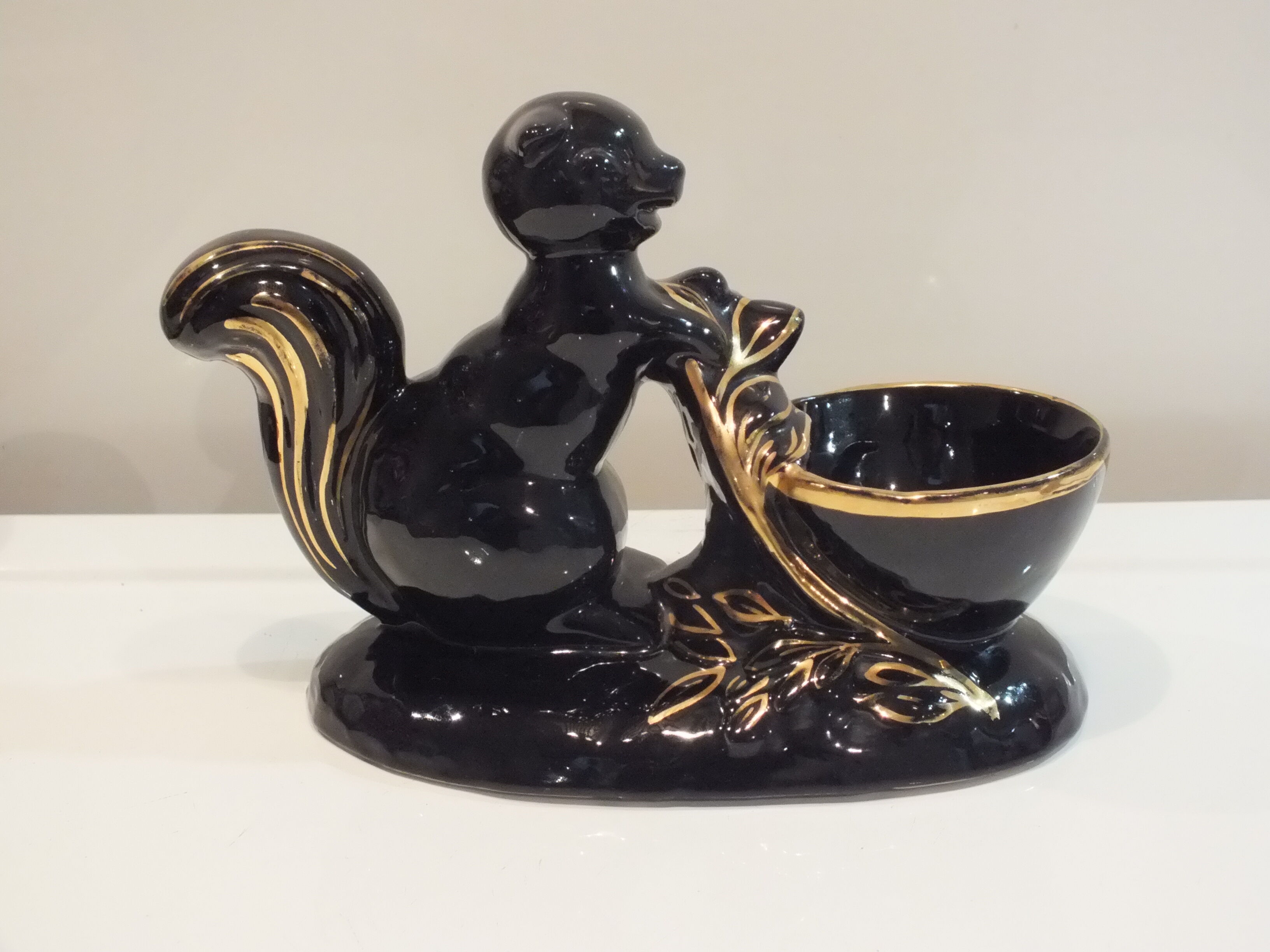 Black and gold ceramic squirrel pot cache from the 50s