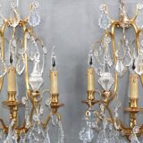 Pair of Louis XVI style gilded bronze & bohemian crystal sconces