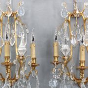 Pair of Louis XVI style gilded bronze & bohemian crystal sconces