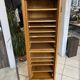 1950s oak office storage cabinet with curtains.