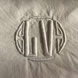 Paire de draps marqués LV